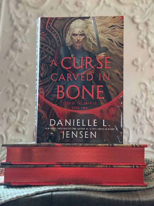 A Curse Carved in Bone: Book Two of the Saga of the Unfated by Danielle L. Jensen