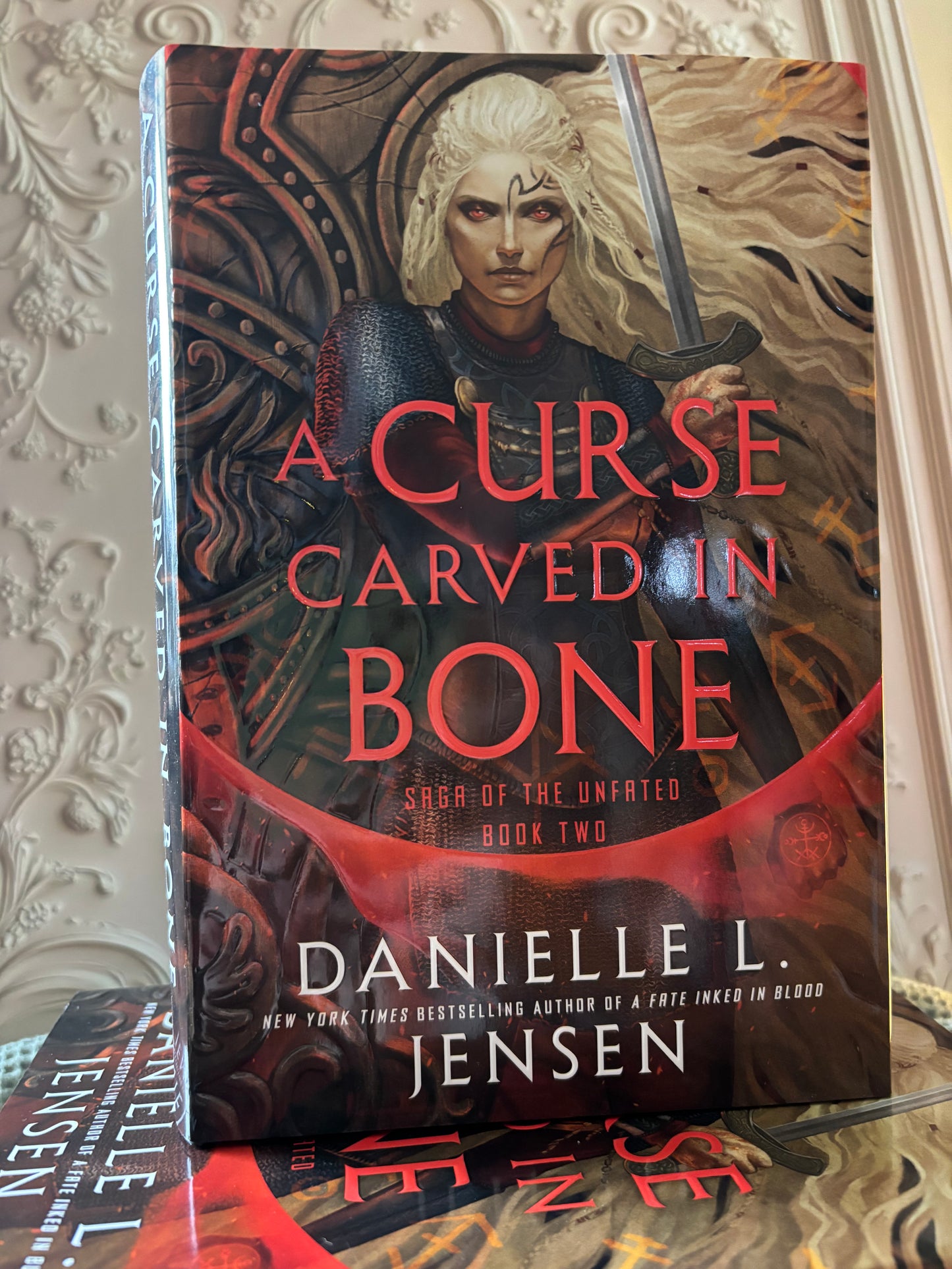 A Curse Carved in Bone: Book Two of the Saga of the Unfated by Danielle L. Jensen